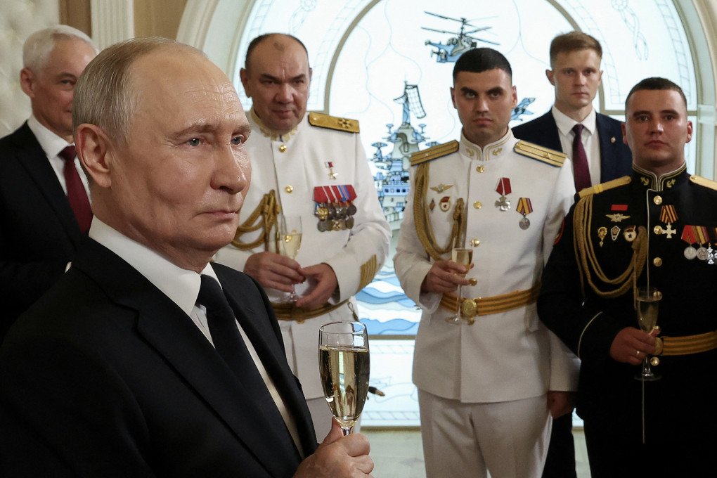 Russia's leader Vladimir Putin (L) raises a glass in a toast as he celebrates Navy Day with Russian Navy servicemen in Saint Petersburg on July 26, 2026. (Photo: Vyacheslav Prokofyev via Getty Images) Russia's leader Vladimir Putin (L) raises a glass in a toast as he celebrates Navy Day with Russian Navy servicemen in Saint Petersburg on July 26, 2026. (Photo: Vyacheslav Prokofyev via Getty Images)