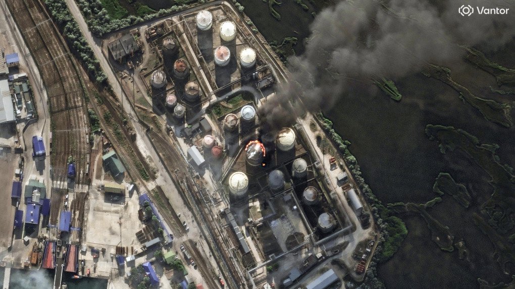 Satellite image shows a fire burning at an oil storage facility with black smoke rising above the storage tanks in Kavkaz Port, Russia. (Satellite image: Vantor)