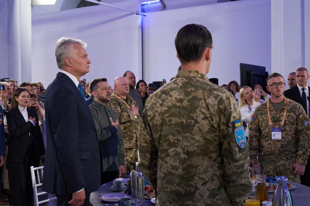 Ukrainian President Volodymyr Zelenskyy and Lithuanian President Gitanas Nausėda stand alongside Ukrainian service members during the National Prayer Breakfast of Ukraine in Kyiv on August 23, 2026. (Source: Mykyta Shandyba/UNITED24 Media)