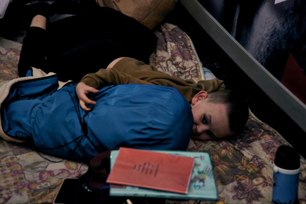 Yuliia’s son Illia takes shelter in a Kyiv metro station, tens of meters underground. Kyiv, Ukraine, October 6, 2026 (Photo: Louis Beaudemont/UNITED24 Media)