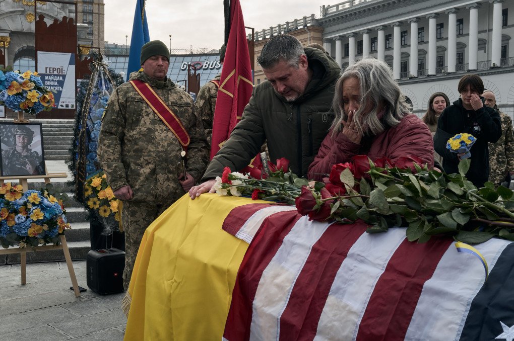 Ethan’s parents John and Leslie Hertweck mourn by their son's coffin during a memorial service on February 28 2025 in Kyiv, Ukraine. (Photo by Paula Bronstein / Getty Images) Ethan’s parents John and Leslie Hertweck mourn by their son's coffin during a memorial service on February 28 2025 in Kyiv, Ukraine. (Photo by Paula Bronstein / Getty Images)