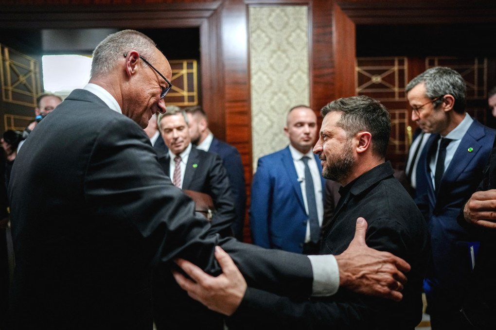 Chancellor Friedrich Merz (CDU) and Volodymyr Zelenskyy, President of Ukraine, say goodbye to each other after an economic forum. (Photo by Kay Nietfeld via Getty Images)