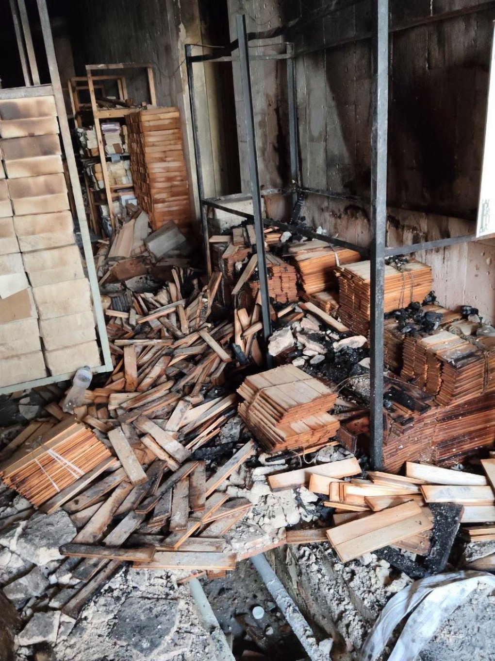 Fire-damaged materials and debris inside the Kherson Regional Art Museum following a Russian FPV drone attack. (Source: Kherson Regional Art Museum)