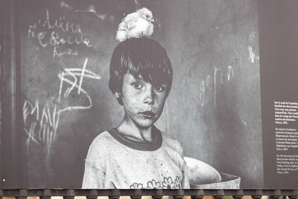 A portrait from Oleksandr Glyadyelov’s long-term documentary work, reflecting childhood and vulnerability in post-Soviet Ukraine. (Photo: French Institute)