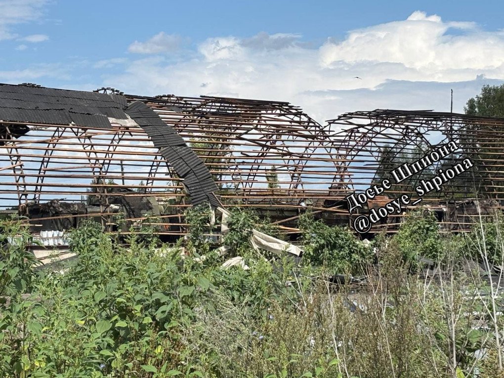 Collapsed hangar structure at Molkino training ground, with destroyed Russian military equipment inside. (Source: Dossier Shpiona/Telegram)