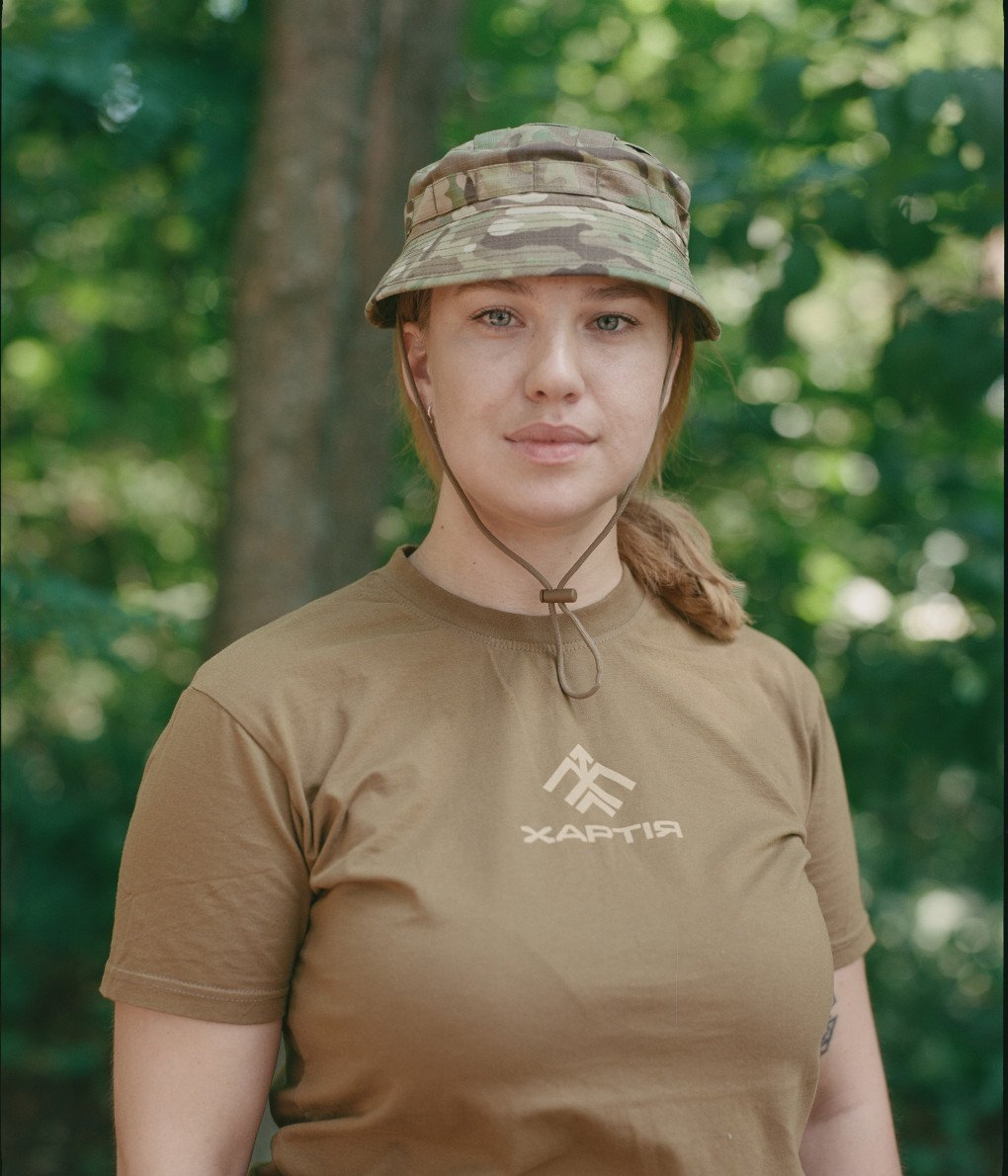 Sapfira, 28, first deputy battalion commander, poses for a photo in the Kharkiv region, July 2025. (Source: Joshua Olley) Sapfira, 28, first deputy battalion commander, poses for a photo in the Kharkiv region, July 2025. (Source: Joshua Olley)