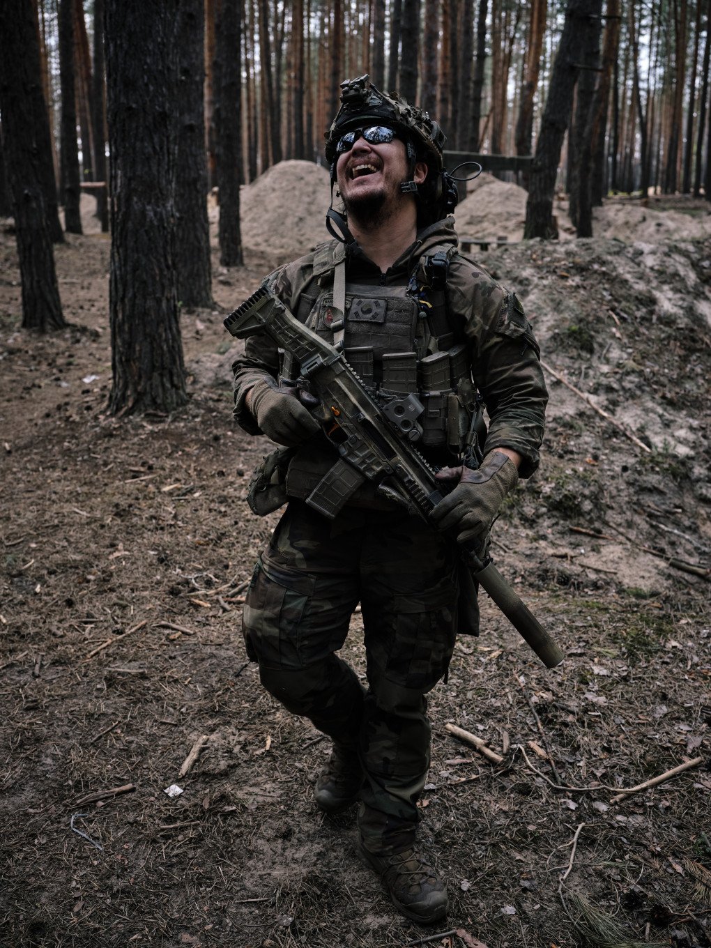 Kahn, a Korean American veteran of the Afghan War, now serves with the 3rd Assault Infantry. Kahn, a Korean American veteran of the Afghan War, now serves with the 3rd Assault Infantry.