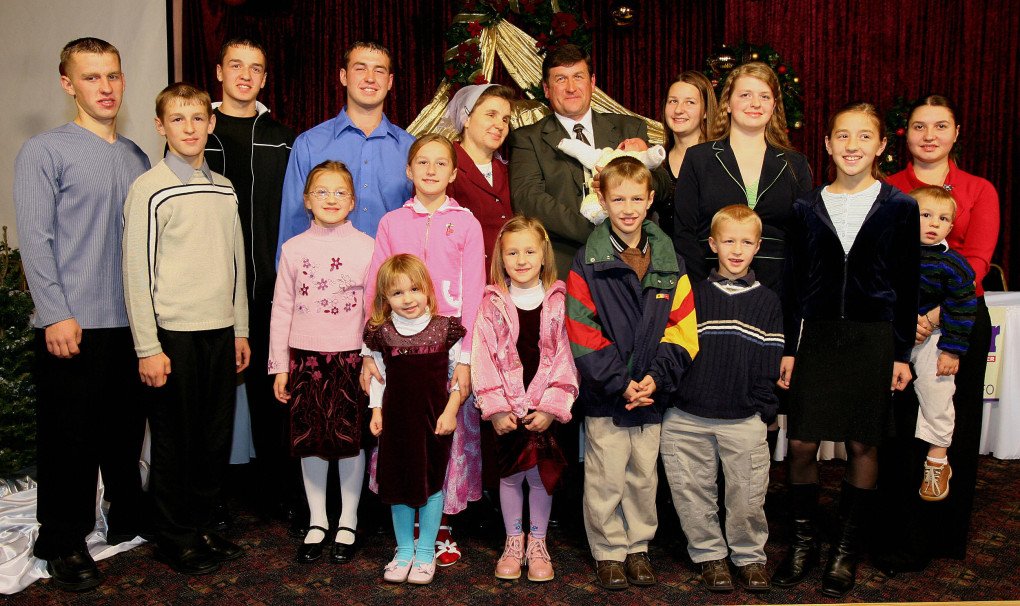 The Chernenko family during a press conference where it was announced that with the birth of their son David on December 7, 2005. Cradled delicately in Chernenko's thick arms was his baby, David, whose birth on December 7 gave the Ukrainian-American family the largest brood in the United States, according to the newspaper The Speaker. "When we got married back in the Ukraine, for six month we had no children and thought we wouldn't have any kids at all," Vladimir told reporters at a celebration in Bethany Slavic Missionary Church in Sacramento. (Photo credit should read MONICA DAVEY/AFP via Getty Images) The Chernenko family during a press conference where it was announced that with the birth of their son David on December 7, 2005. Cradled delicately in Chernenko's thick arms was his baby, David, whose birth on December 7 gave the Ukrainian-American family the largest brood in the United States, according to the newspaper The Speaker. "When we got married back in the Ukraine, for six month we had no children and thought we wouldn't have any kids at all," Vladimir told reporters at a celebration in Bethany Slavic Missionary Church in Sacramento. (Photo credit should read MONICA DAVEY/AFP via Getty Images)