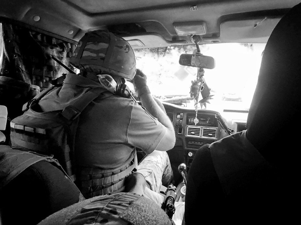 Mazha, former combat medic of Hospitaller Battalion praying he drives us into Avdiivka, Donbas region (Source: Jessica Daly UNITED24 Media) Mazha, former combat medic of Hospitaller Battalion praying he drives us into Avdiivka, Donbas region (Source: Jessica Daly UNITED24 Media)