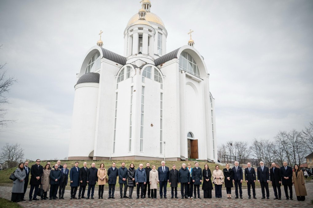 Ukrainian and EU officials gather before the Bucha church, reaffirming the shared demand for international justice and a Special Tribunal for war crimes. Ukrainian and EU officials gather before the Bucha church, reaffirming the shared demand for international justice and a Special Tribunal for war crimes.