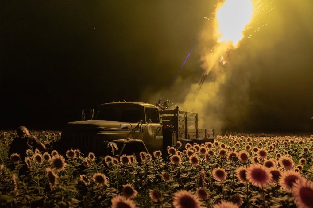 A Ukrainian mobile air defense unit fires at Russian aerial targets during a nighttime operation in a sunflower field. (Source: Roman Pilipey/Instagram) A Ukrainian mobile air defense unit fires at Russian aerial targets during a nighttime operation in a sunflower field. (Source: Roman Pilipey/Instagram)