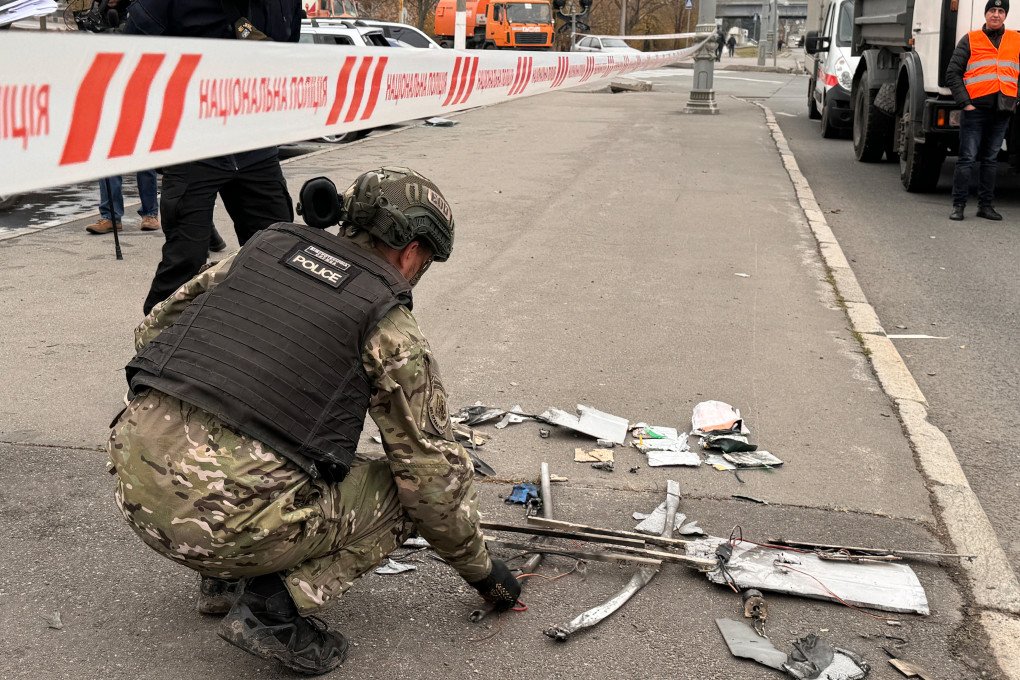A police officer inspects collected fragments of a Russian kamikaze drone "Molniya-1" at the site of its impact on a car parking on November 13, 2024 in Kharkiv, Ukraine. (Photo by Valeriia Yemets via Getty Images) A police officer inspects collected fragments of a Russian kamikaze drone "Molniya-1" at the site of its impact on a car parking on November 13, 2024 in Kharkiv, Ukraine. (Photo by Valeriia Yemets via Getty Images)