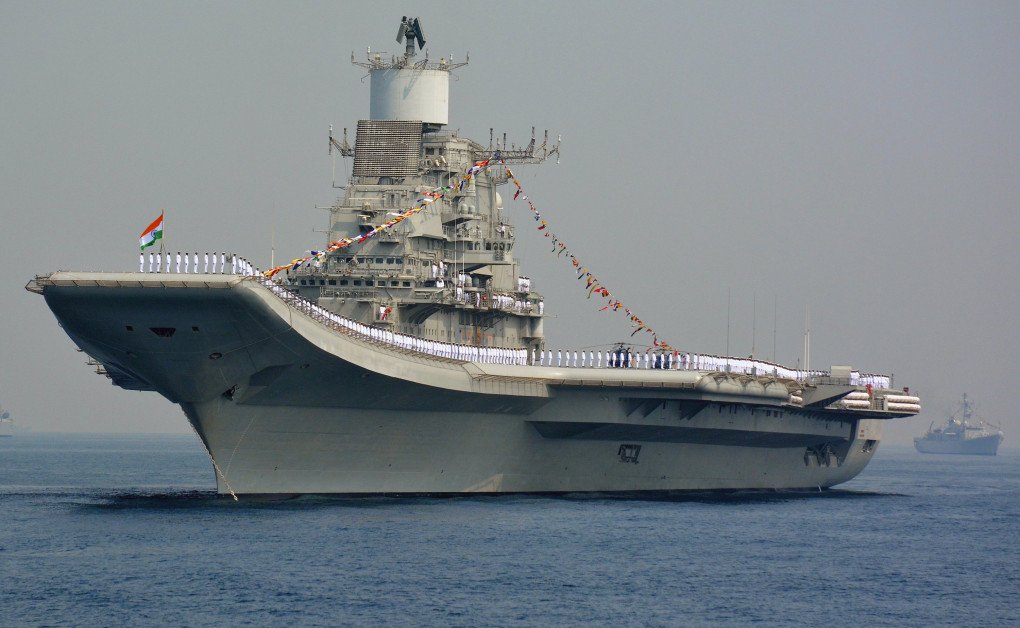 Indian Navy personnel stand on the INS Vikramaditya, a modified Kiev-class aircraft carrier, during the International Fleet Review in Visakhapatnam on February 6, 2016. (Source: Getty Images)
