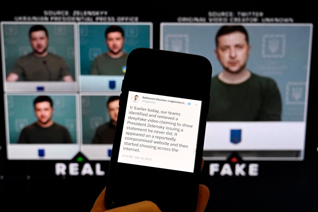 This illustration photo taken on January 30, 2023 shows a phone screen displaying a statement from the head of security policy at META with a fake video (R) of Ukrainian President Volodymyr Zelensky calling on his soldiers to lay down their weapons shown in the background, in Washington, DC. (Photo: OLIVIER DOULIERY / AFP via Getty Images) This illustration photo taken on January 30, 2023 shows a phone screen displaying a statement from the head of security policy at META with a fake video (R) of Ukrainian President Volodymyr Zelensky calling on his soldiers to lay down their weapons shown in the background, in Washington, DC. (Photo: OLIVIER DOULIERY / AFP via Getty Images)