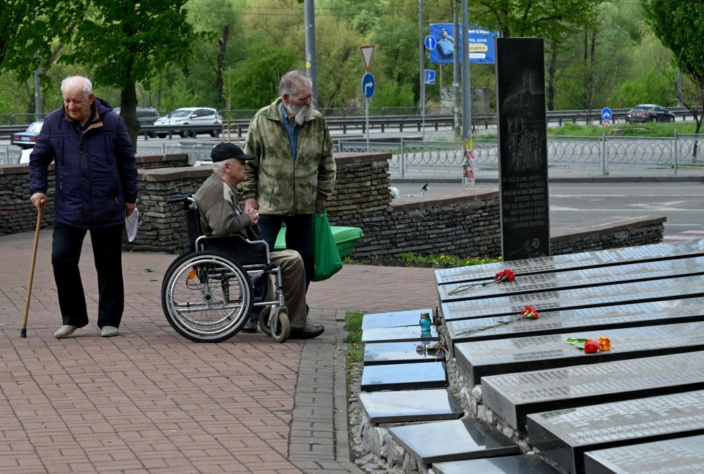 Liquidators of Chornobyl nuclear power plant catastrophe talk near plates with names of their lost friends at Chornobyl memorial in Kyiv on April 26, 2025 during the commemoration of the victims of the Chornobyl nuclear disaster on the 39th anniversary of the world's worst nuclear accident. (Photo by Sergei SUPINSKY via Getty Images) Liquidators of Chornobyl nuclear power plant catastrophe talk near plates with names of their lost friends at Chornobyl memorial in Kyiv on April 26, 2025 during the commemoration of the victims of the Chornobyl nuclear disaster on the 39th anniversary of the world's worst nuclear accident. (Photo by Sergei SUPINSKY via Getty Images)