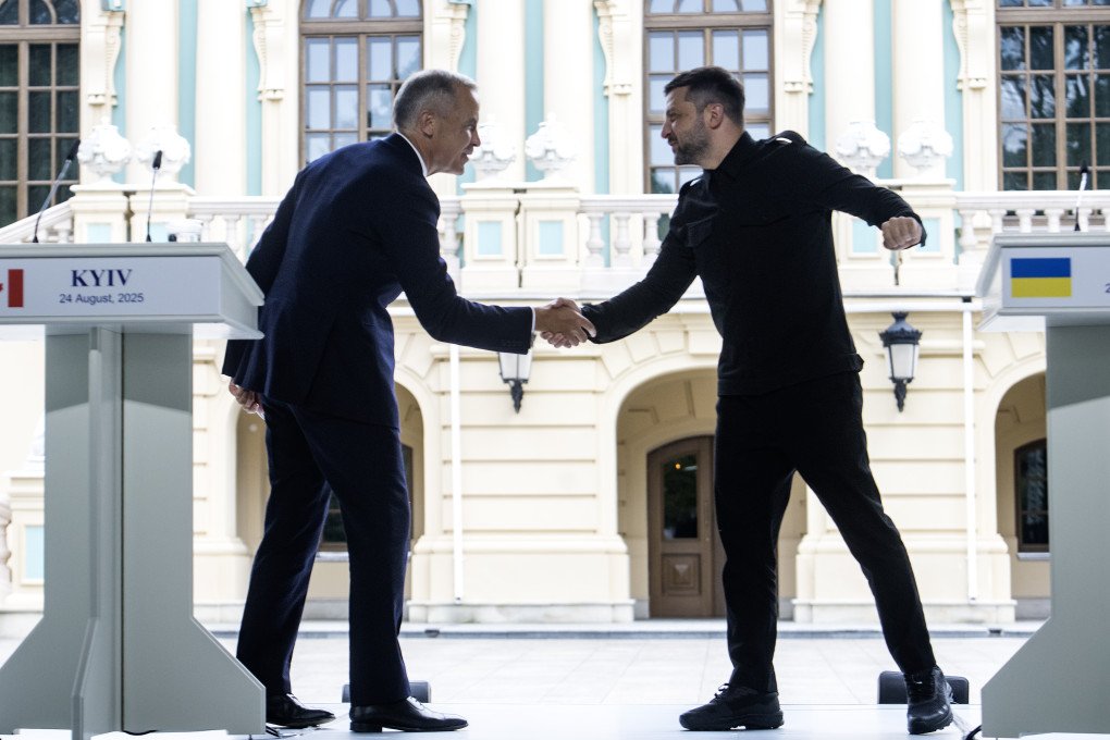 Ukrainian President Volodymyr Zelenskyy and Canadian Prime Minister Mark Carney shake hands during a joint press conference on Ukraine's Independence Day in Kyiv, Ukraine, on August 24, 2025. (Photo by Maxym Marusenko via Getty Images) Ukrainian President Volodymyr Zelenskyy and Canadian Prime Minister Mark Carney shake hands during a joint press conference on Ukraine's Independence Day in Kyiv, Ukraine, on August 24, 2025. (Photo by Maxym Marusenko via Getty Images)