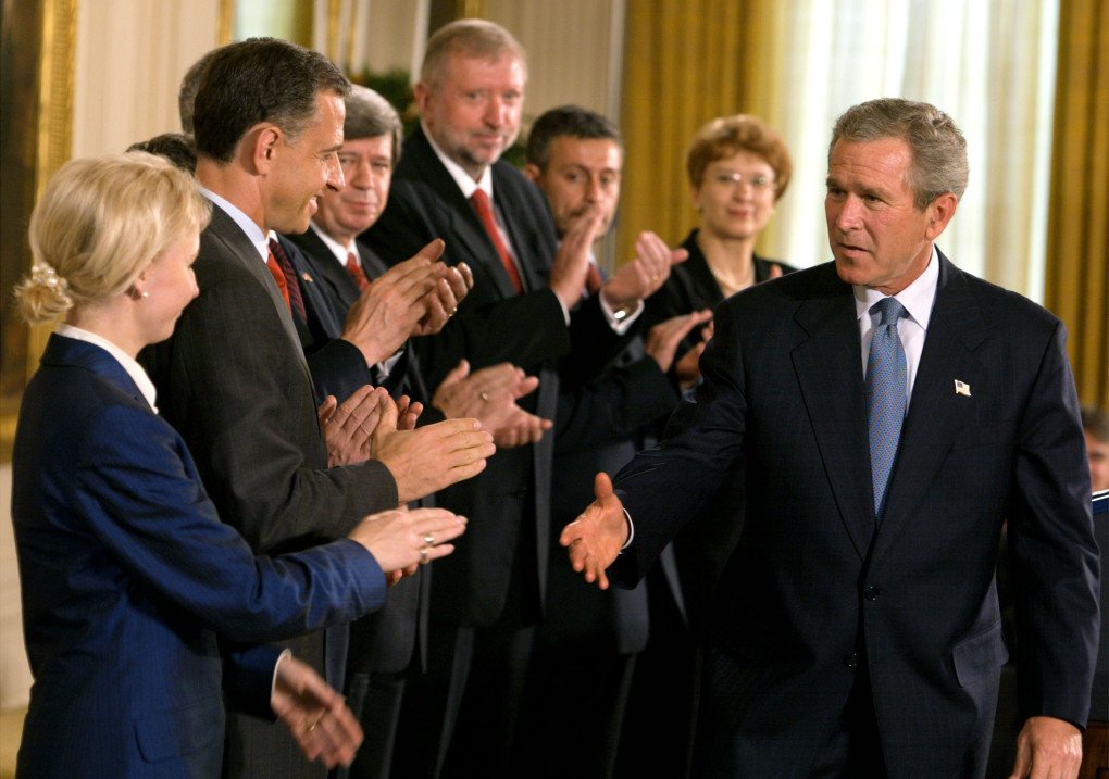 Former US President George W. Bush greets the foreign ministers of seven Eastern European nations invited to join NATO during a ceremony at the White House on May 8, 2003. (Source: Getty Images) Former US President George W. Bush greets the foreign ministers of seven Eastern European nations invited to join NATO during a ceremony at the White House on May 8, 2003. (Source: Getty Images)