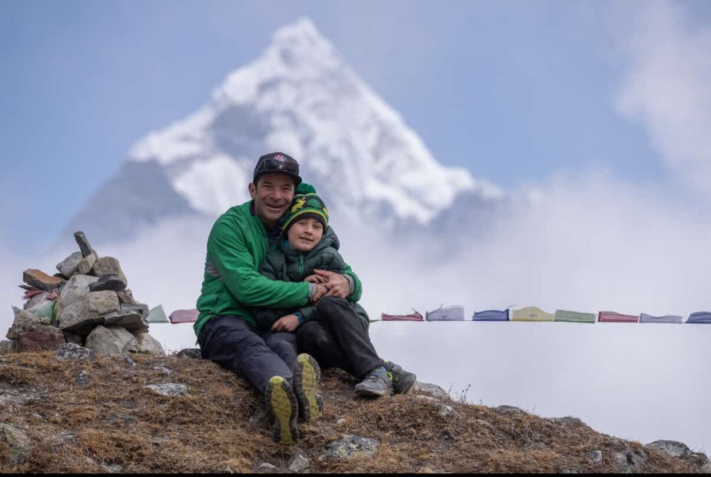 Fisher with his son near Everest. Photo: courtesy of Mark Fisher.