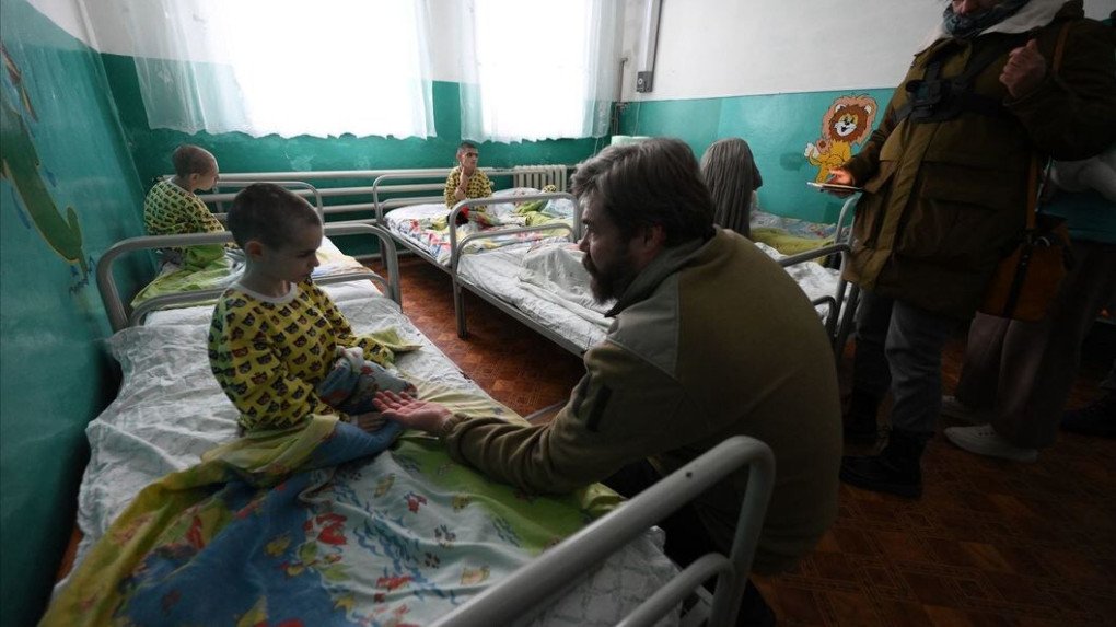 Konstantin Malofeev at an orphanage in the Russian-occupied region of Ukraine, where he supported the unlawful deportation of the children to Russia with Maria Lvova-Belova. (Source: Konstantin Malofeev via Telegram)