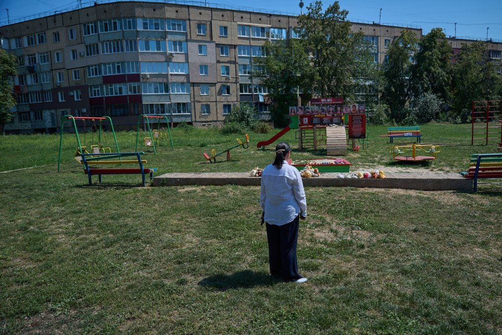 Mariia Cherviachenko, Director of the Kryvyi Rih City Development Institute and a resident of a building affected by the Russian attack stands in front of the playground, where nine children were killed on April 4, 2025, Kryvyi Rih, Ukraine, August 2026. Photo by Mykyta Shandyba/UNITED24 Media Mariia Cherviachenko, Director of the Kryvyi Rih City Development Institute and a resident of a building affected by the Russian attack stands in front of the playground, where nine children were killed on April 4, 2025, Kryvyi Rih, Ukraine, August 2026. Photo by Mykyta Shandyba/UNITED24 Media