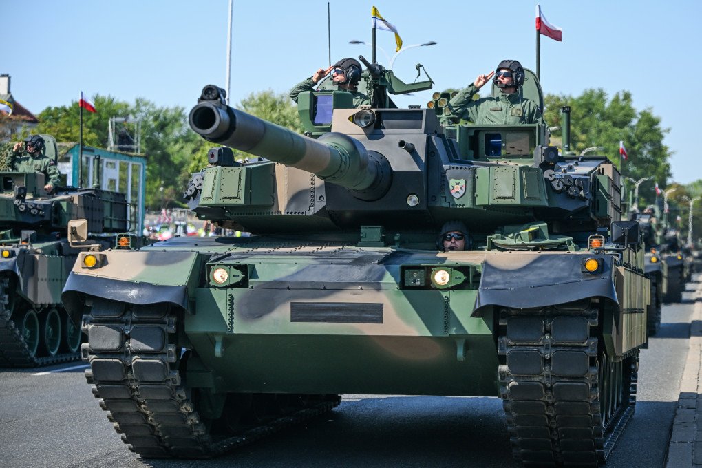 Polish Armed Forces' K-2 Black Panther tanks during the Armed Forces Day parade in Warsaw, Poland, on August 15, 2025. (Source: Getty Images)