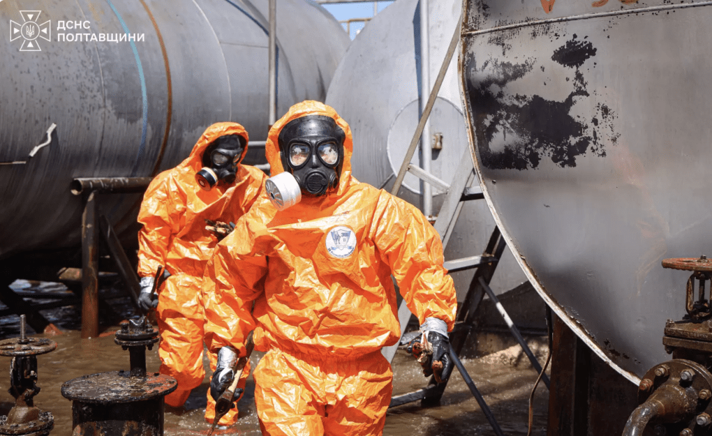 Emergency responders in protective chemical suits work to seal damaged storage tanks after a hazardous substance leak triggered by a Russian strike in Ukraine's Poltava region. (Source: State Emergency Service of Ukraine) Emergency responders in protective chemical suits work to seal damaged storage tanks after a hazardous substance leak triggered by a Russian strike in Ukraine's Poltava region. (Source: State Emergency Service of Ukraine)
