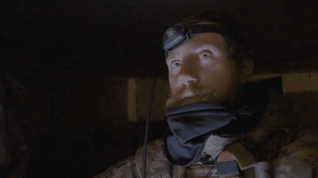 Combat medic callsign "Jesus"—a staunch atheist—is one of the seven main subjects featured in Brace for Oblivion. February 2023, Bakhmut direction, Donetsk region. (Photo: Xackery Irving)