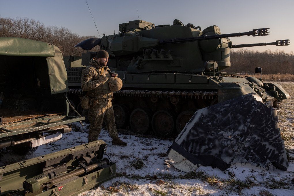 A Ukrainian serviceman of a drone-hunting team stands next to a German Gepard anti-aircraft-gun tank that is used to target Russian-launched drones, in the outskirts of Kyiv, on November 30, 2023. (Source: Getty Images) A Ukrainian serviceman of a drone-hunting team stands next to a German Gepard anti-aircraft-gun tank that is used to target Russian-launched drones, in the outskirts of Kyiv, on November 30, 2023. (Source: Getty Images)