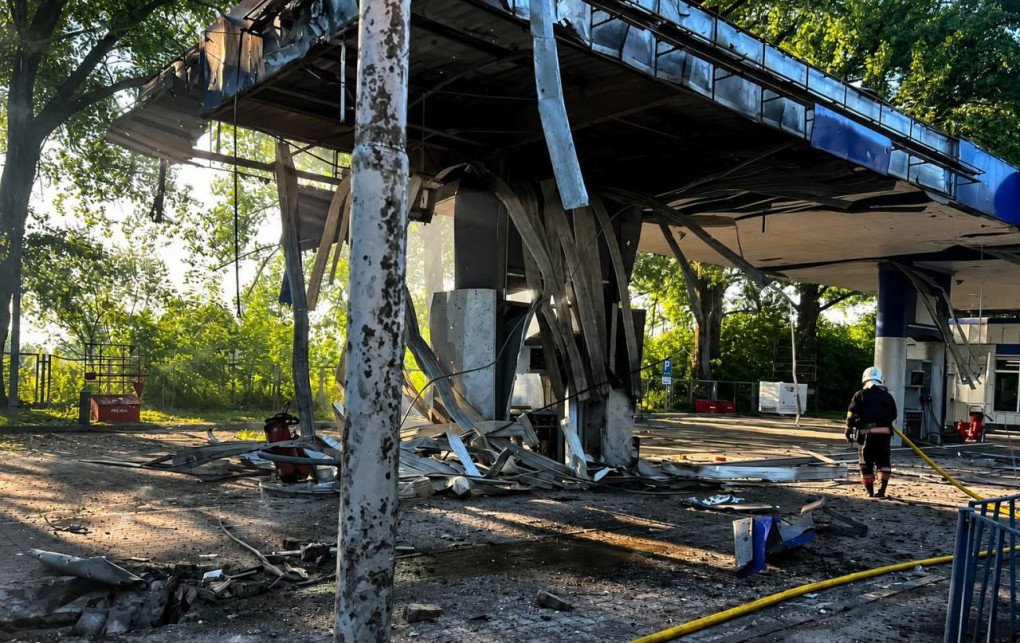 A firefighter inspects the heavily damaged canopy of a gas station in Malyn, Zhytomyr Oblast, following a Russian drone strike. (Source: Serhii “Flash” Beskrestnov)