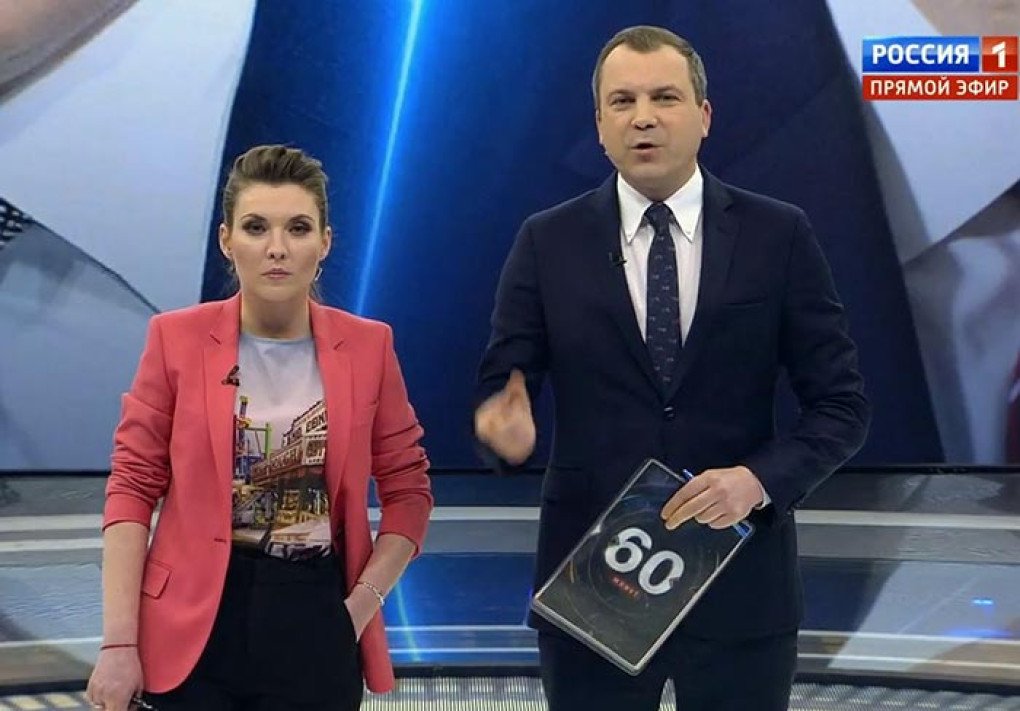 Pro-Kremlin TV host Olga Skabeyeva and co-host Evgeny Popov at one of the broadcast of 60 Minutes TV show. (Source: stuki-druki.com) Pro-Kremlin TV host Olga Skabeyeva and co-host Evgeny Popov at one of the broadcast of 60 Minutes TV show. (Source: stuki-druki.com)