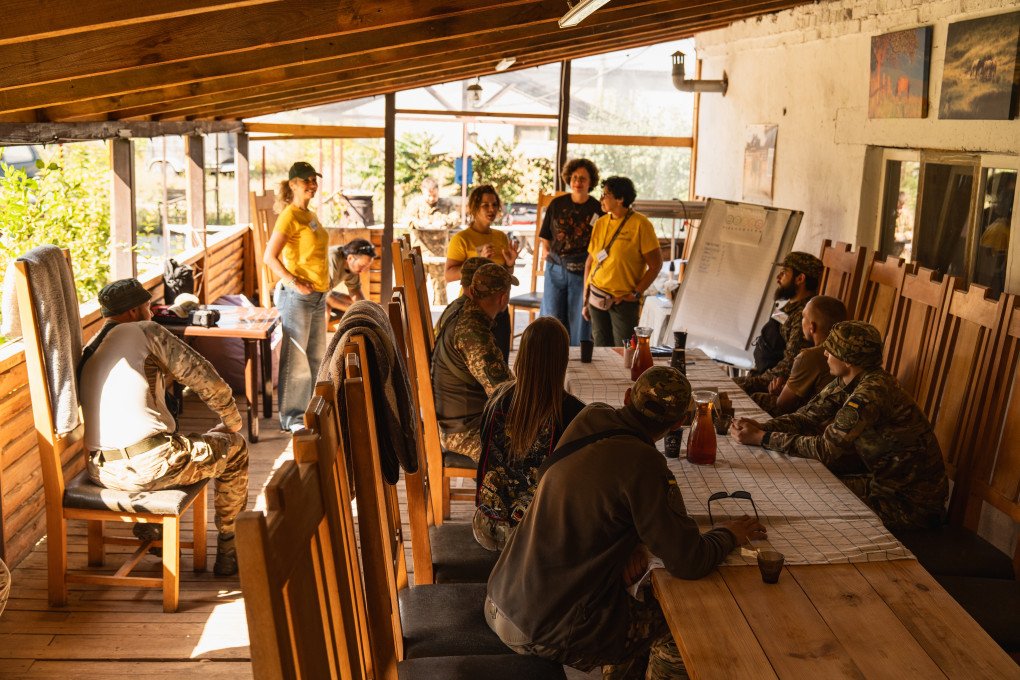 Psychologists Natella Dubashidze, Oksana, and Nataliia, alongside horse handler Inesa, lead an initial orientation for visiting service members of the Rubizh brigade. September 2026, Kyiv region. (Photo by Nika Lastvika/EquiReHab Ukraine) Psychologists Natella Dubashidze, Oksana, and Nataliia, alongside horse handler Inesa, lead an initial orientation for visiting service members of the Rubizh brigade. September 2026, Kyiv region. (Photo by Nika Lastvika/EquiReHab Ukraine)