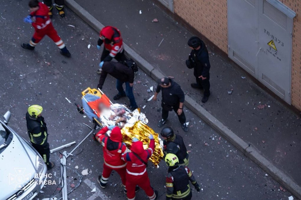 Emergency crews evacuate an injured person following a Russian drone strike on a residential building in Kyiv. (Source: State Emergency Service) Emergency crews evacuate an injured person following a Russian drone strike on a residential building in Kyiv. (Source: State Emergency Service)