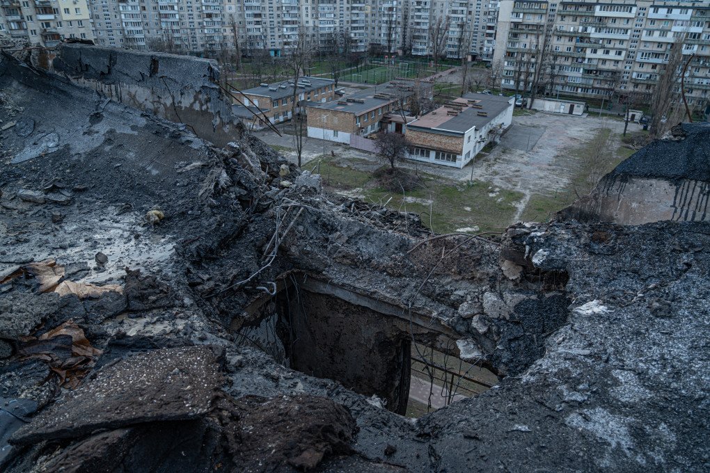KYIV, MARCH 23, 2025: The aftermath of a Russian Shahed drone strike that hit the roof of an apartment building in Kyiv, piercing the ceiling of 80-year-old Ludmyla Zarutska’s home. Ludmyla survived the initial impact—she had been sleeping in another room when the drone tore through her apartment. The blast shattered the concrete walls and jammed her door shut. She screamed for help through an open window as neighbors tried desperately to reach her, but they couldn’t break through. By the time rescue workers forced the door open, it was too late. Only a package of old photographs survived the fire. That’s what her son received when he arrived at the scene. (Photo: Anton Shtuka)