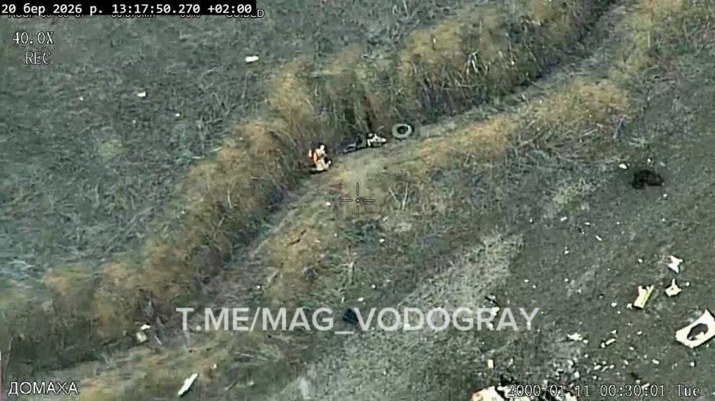 Pilots of the Russian Ka-52 helicopter, killed on the ground not far from the crash site, March 20, 2026. (Source: MAG_VODOGRAY/Telergam)