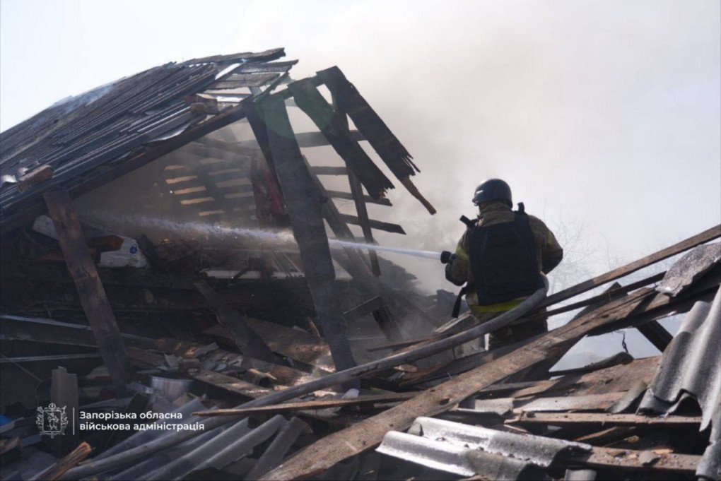 Emergency workers extinguish a fire at the site of a house damaged during a Russian attack in Zaporizhzhia region. (Source: Zaporizhzhia Regional Military Administration)
