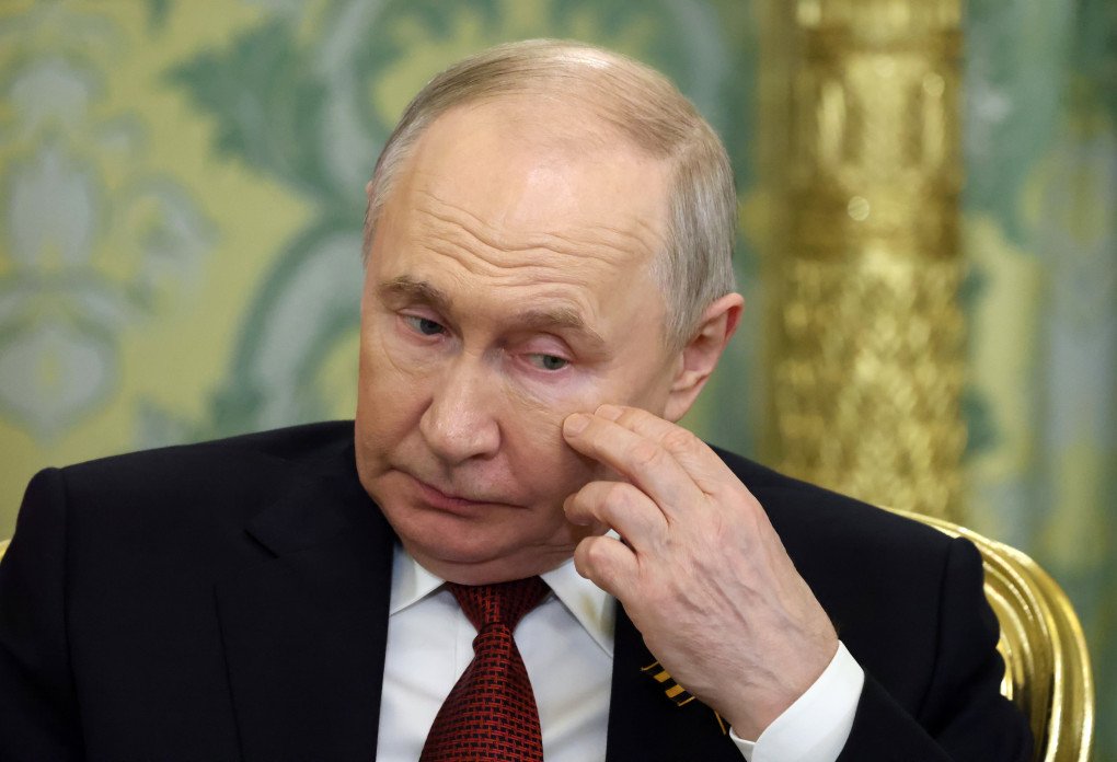 Russian leader Vladimir Putin grimases during a Russian-South Ossetian talks at the Saint Yekateina's Hall of the Great Kremlin Palace after the Victory Day parade in Moscow, Russia. (Photo: Contributor via Getty Images)