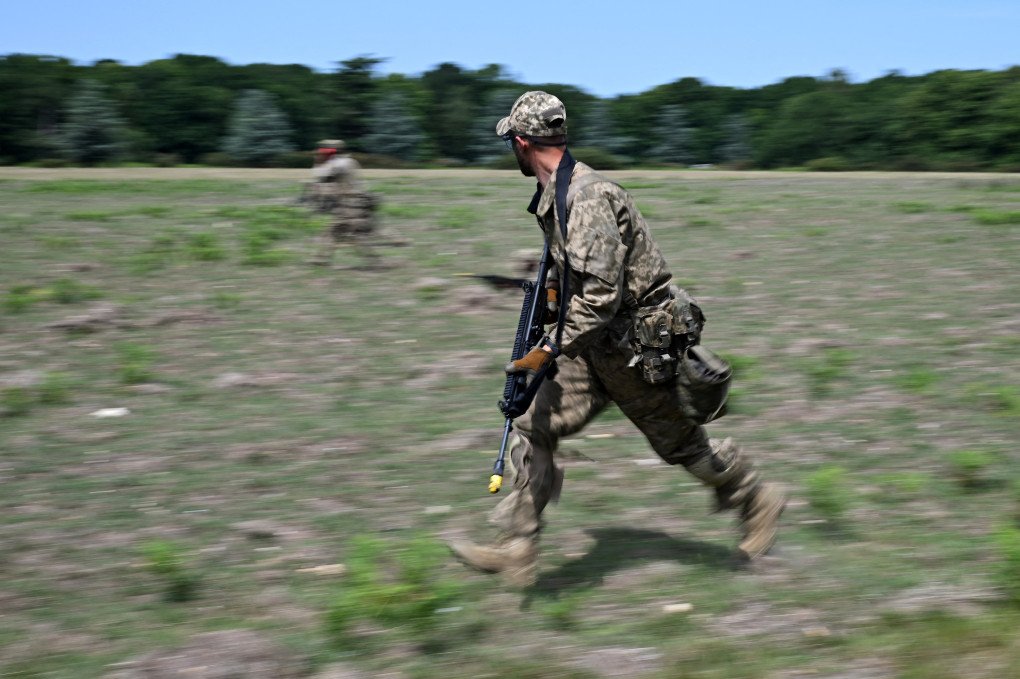 Ukrainian soldiers take part in a training excercise operated by British and Netherlands' armed forces as part of the Interflex programme, in eastern England, on June 17, 2025. (Photo by Justin Tallis via Getty Images)