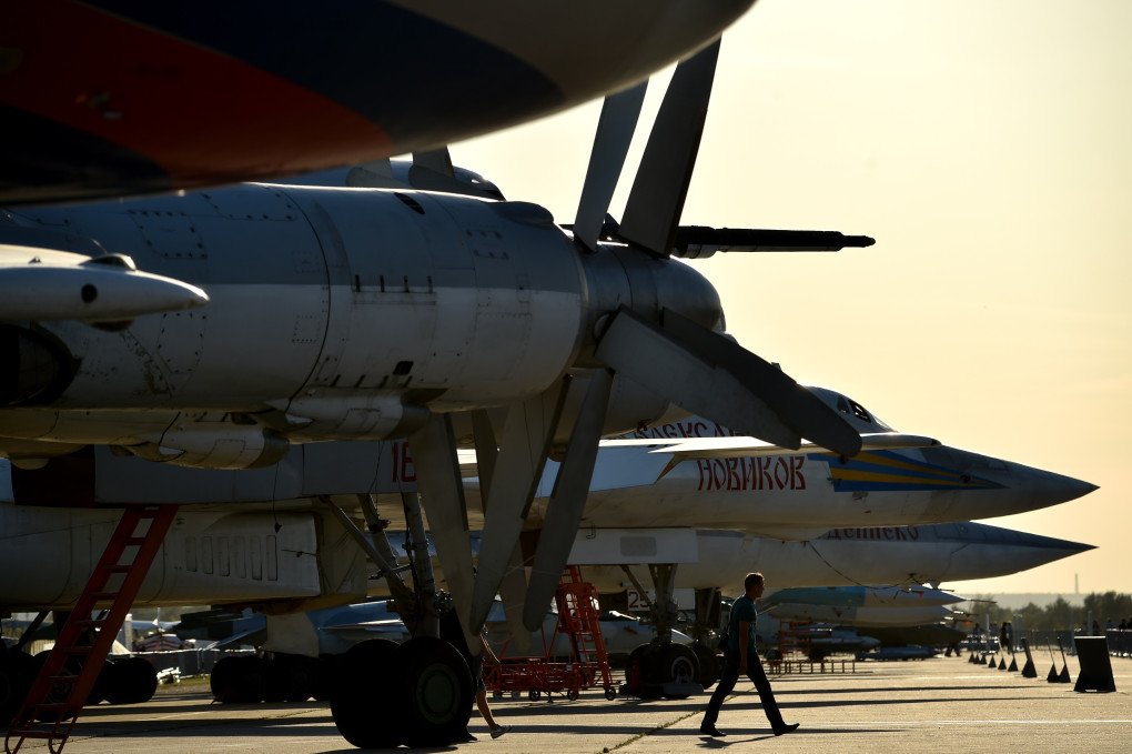 A man walks close to a Tupolev Tu-95MS turboprop-powered strategic bomber and a Russian Tu-160 during the MAKS-2015, the International Aviation and Space Show, in Zhukovsky, outside Moscow, on August 25, 2015. (Source: Getty Images) A man walks close to a Tupolev Tu-95MS turboprop-powered strategic bomber and a Russian Tu-160 during the MAKS-2015, the International Aviation and Space Show, in Zhukovsky, outside Moscow, on August 25, 2015. (Source: Getty Images)