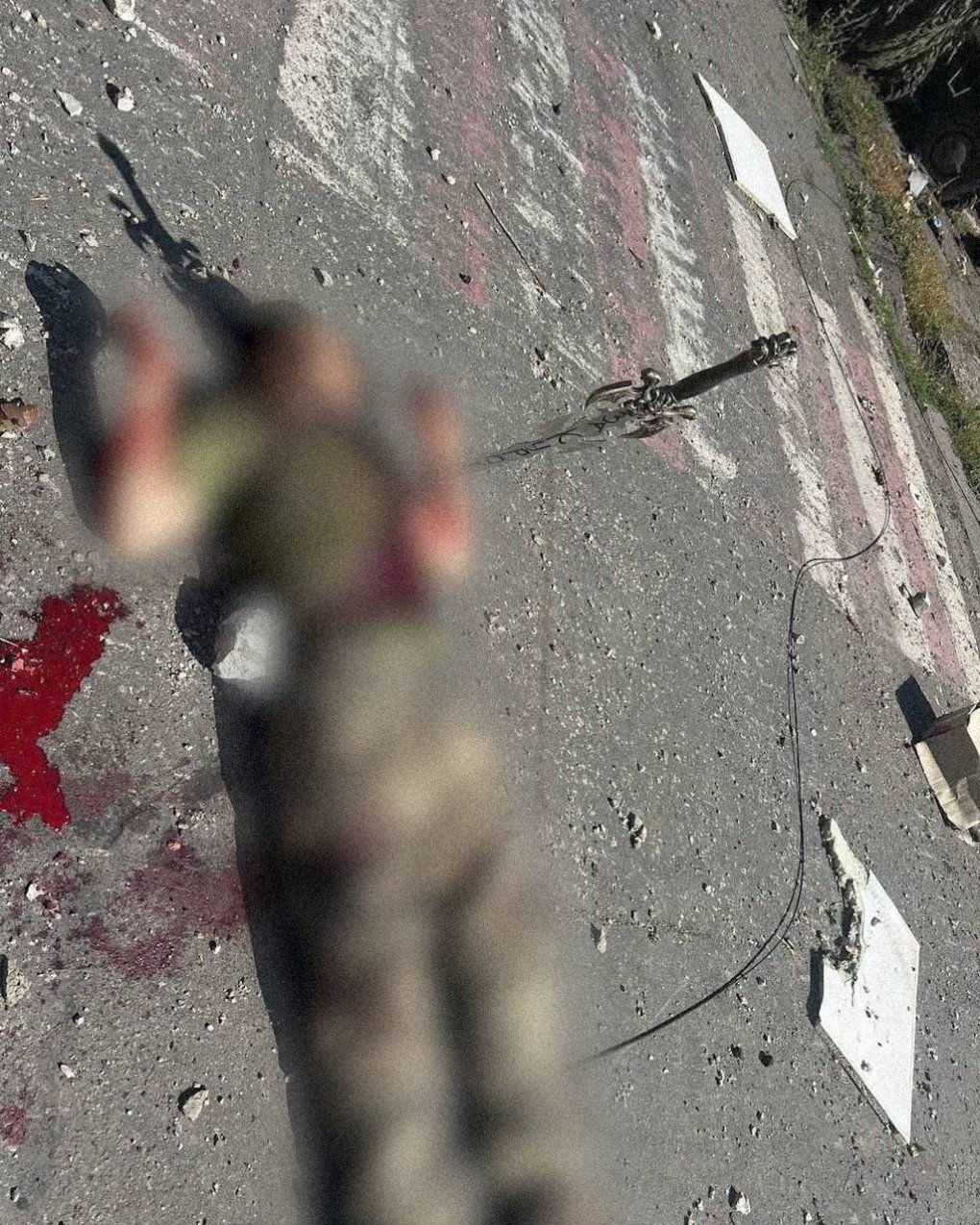 An unarmed Ukrainian prisoner of war executed by Russian forces with a sword, that was inscribed with the words 'For Kursk', on September 17, 2024. (Photo: open source). An unarmed Ukrainian prisoner of war executed by Russian forces with a sword, that was inscribed with the words 'For Kursk', on September 17, 2024. (Photo: open source).