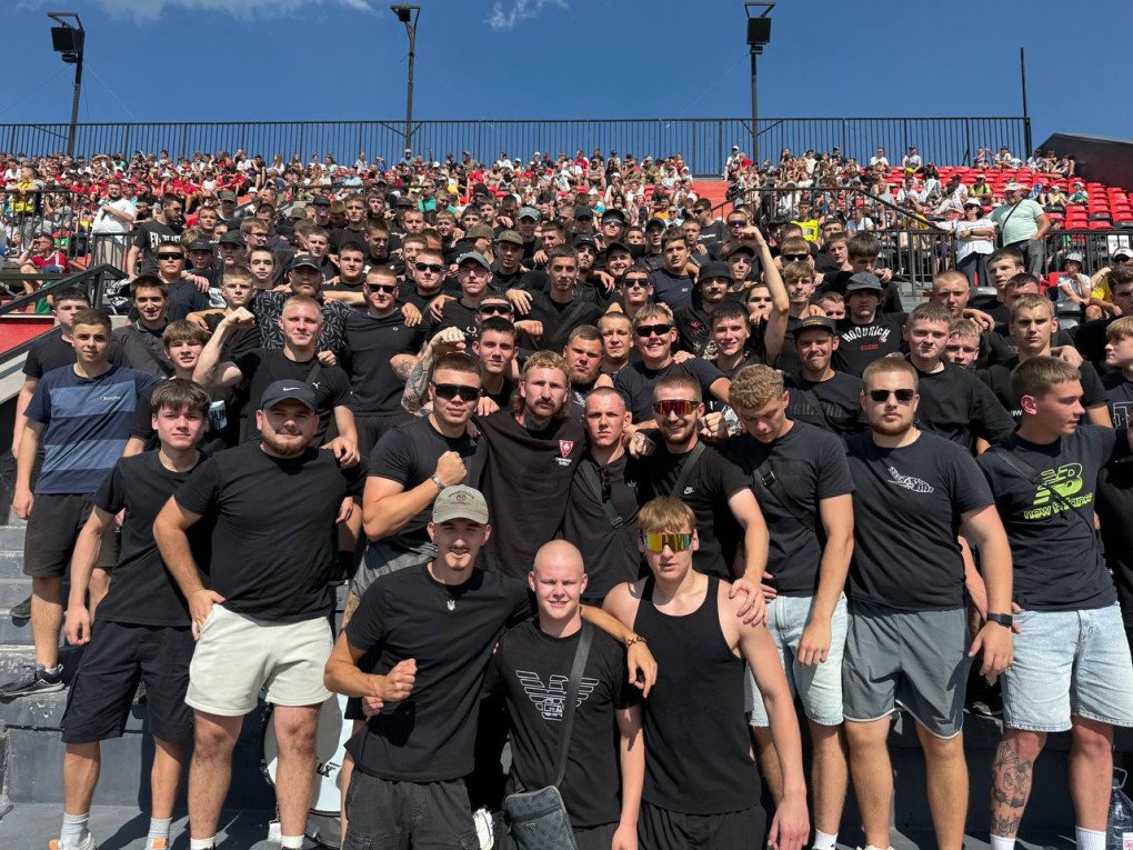Michael Jaworskyj with the Veres Rivne Ultras group, Black Wolf Pack, August 2025. (Source: Gloryhuntas)