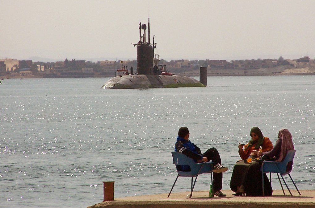 Egyptians sit on a pier as the British Trafalgar class nuclear submarine HMS Trenchant navigates northbound in the Suez canal by the port city of Ismailia, 120 km north east of Cairo, on February 17, 2009. (Photo: AFP via Getty Images) Egyptians sit on a pier as the British Trafalgar class nuclear submarine HMS Trenchant navigates northbound in the Suez canal by the port city of Ismailia, 120 km north east of Cairo, on February 17, 2009. (Photo: AFP via Getty Images)