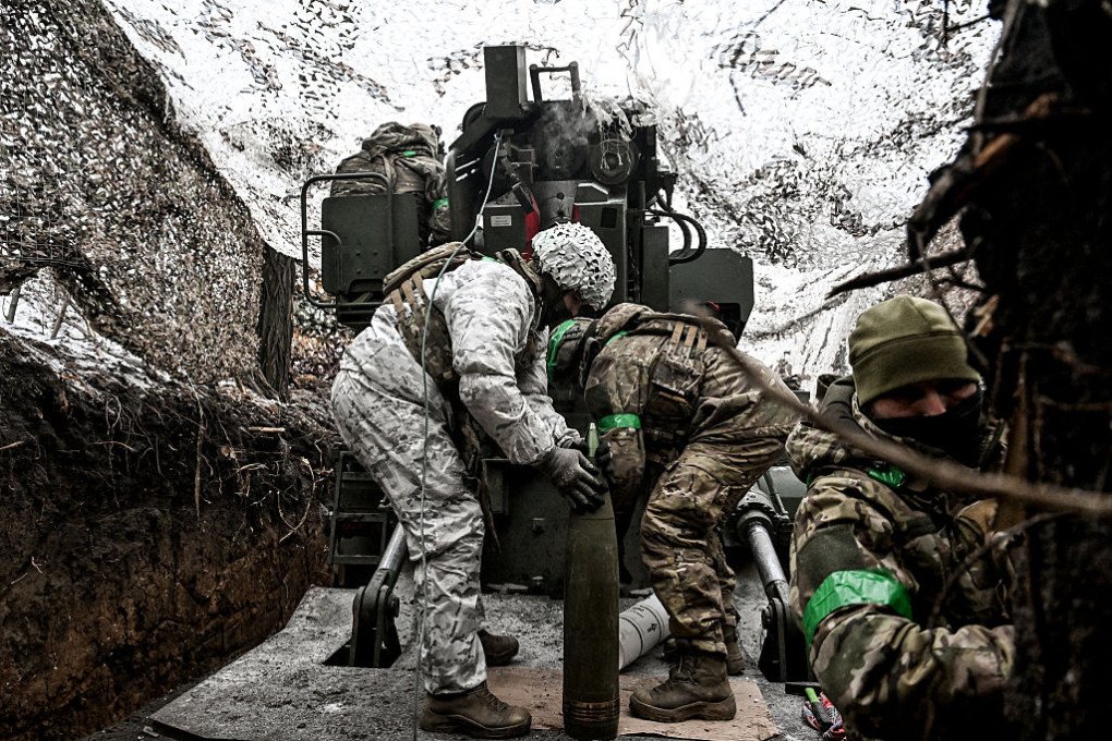 Soldiers from the Striletskyi special forces police battalion of the National Police in Zaporizhzhia region operate a Ukrainian 2S22 Bohdana 155 mm self-propelled howitzer to strike Russian manpower and equipment in the Pokrovsky direction in Donetsk region, Ukraine. (Photo by Dmytro Smolienko / Getty Images). 