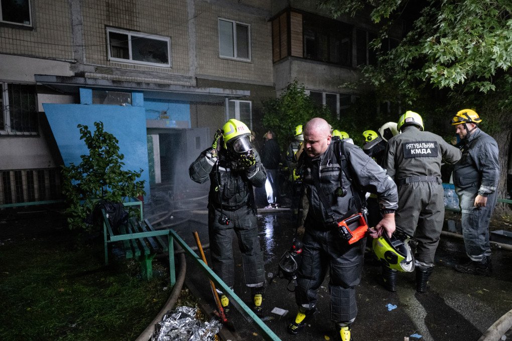 Ukrainian rescuers work at the site of a Russian missile strike at an apartment building in Kyiv on October 14, 2026, amid the Russian invasion of Ukraine. (Photo by Genya Savilov via Getty Images)