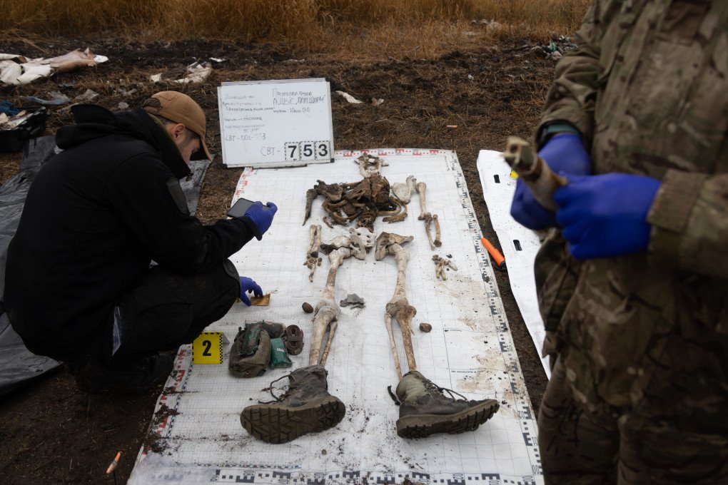 FEB 25 — The weight of war is measured not only in battles but in the silent work of those who bring the fallen home.” The Platsdarm search and exhumation team tirelessly recovers the bodies of soldiers, often from unmarked graves near the front lines, ensuring they are not lost to history. (Photo by Nikoletta Stoyanova for Platsdarm group)