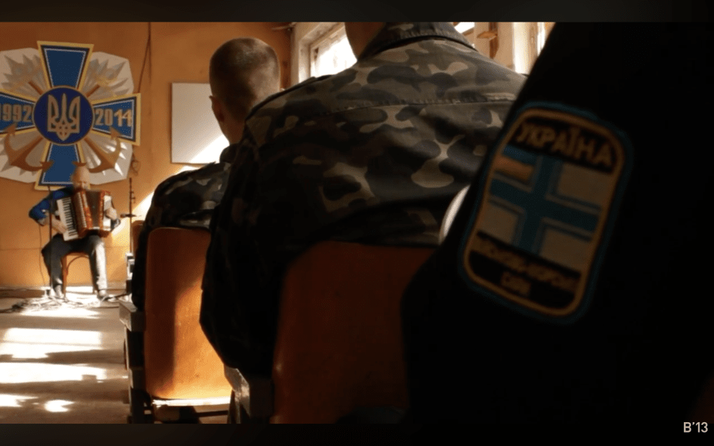 Still from Crimea. Needless Is Off Screen / Krym. Zaĭve za kadrom, released March 12, 2014. The film shows the Belarusian trio Port Mone performing inside a Ukrainian military base in Crimea, under siege by Russian armed forces. (Source: Babylon 13 YouTube channel)