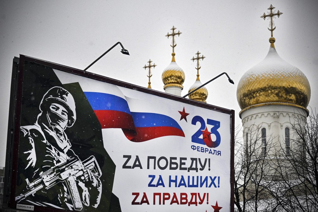 A billboard in Moscow in front of a Church reads "For the Victory! For the Ours! For the Truth!" The Russian Orthodox Church is a major proponent of Russian propaganda and a core part of the occupation in Ukraine. (Photo: Alexander Nemenov via Getty Images) Photo of a church and a Russian propaganda billboard in Moscow