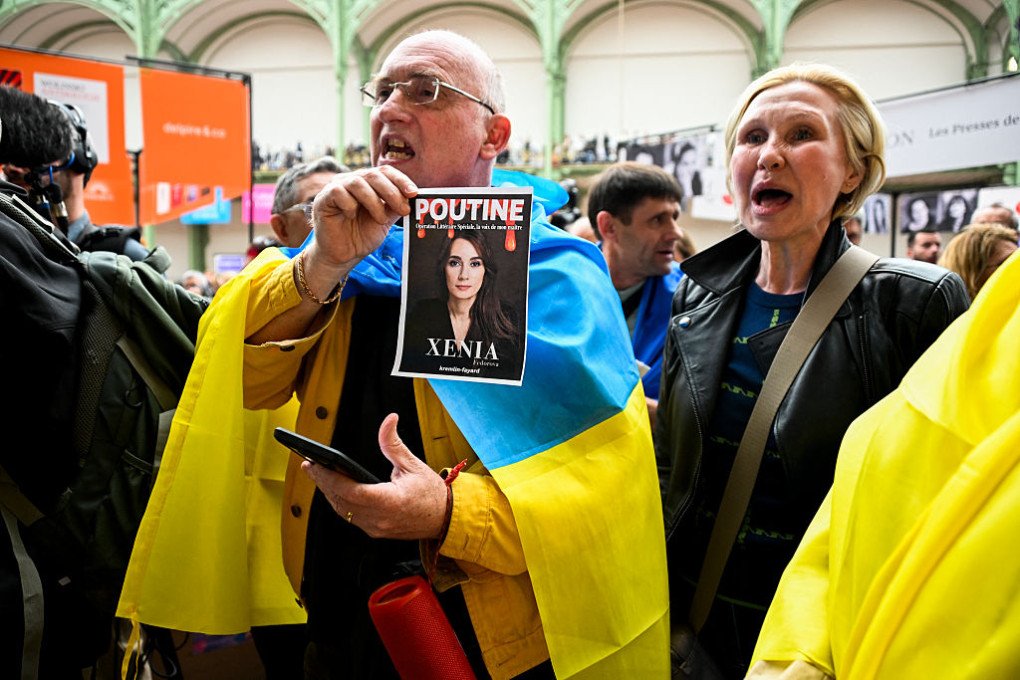 Activists of the “For Ukraine, for their freedom and ours!” stage a protest against the presence of Xenia Fedorova, at the stand of French publishing house Fayard during the Festival du Livre de Paris 2025 book fair at the Grand Palais venue in Paris on April 12, 2025. (Source: Getty Images) Activists of the “For Ukraine, for their freedom and ours!” stage a protest against the presence of Xenia Fedorova, at the stand of French publishing house Fayard during the Festival du Livre de Paris 2025 book fair at the Grand Palais venue in Paris on April 12, 2025. (Source: Getty Images)