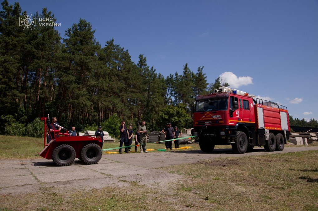 A Ukrainian firefighting robot demonstrates its towing capability by pulling a full-sized fire truck during a field test. (Source: SES of Ukraine) A Ukrainian firefighting robot demonstrates its towing capability by pulling a full-sized fire truck during a field test. (Source: SES of Ukraine)