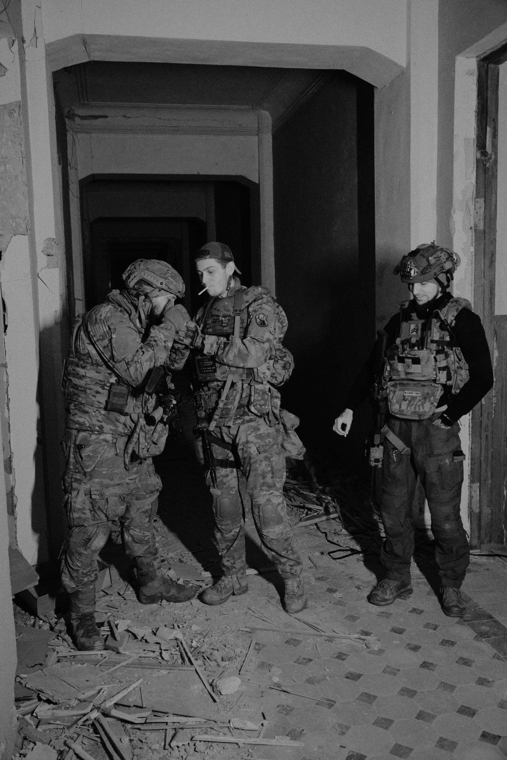 Hepa with his fellow soldiers near the eastern front of Ukraine stopping for a cigarette . Photo: Joshua Olley