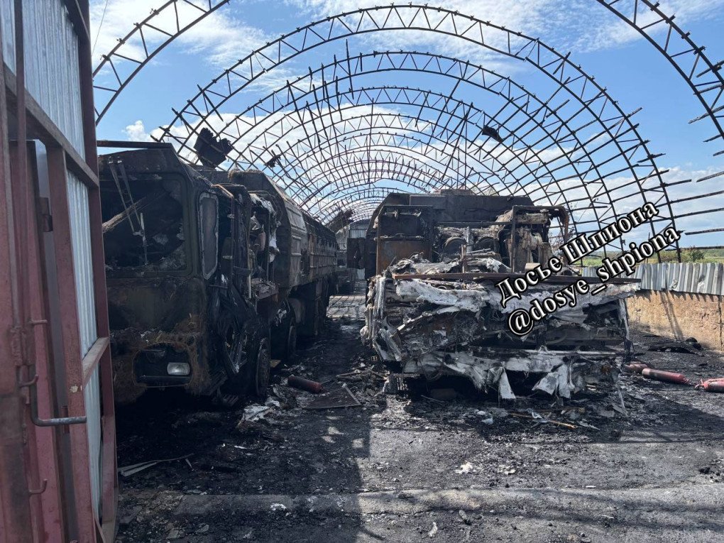Heavily burned Russian military vehicles, including Iskander system support equipment, after the Molkino strike. (Source: Dossier Shpiona/Telegram)